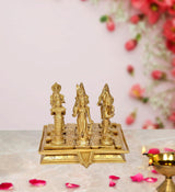 Brass Navagraha statue set with nine planetary deity figures on engraved base