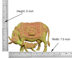5-inch brass cow statue with calf and Lakshmi relief, width marked 7.5 in