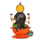 Back view of Lakshmi statue with gold halo, long dark hair, orange lotus base