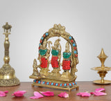 Brass Darbar idol, front view with arched halo and three guard-like figures