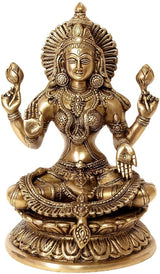 Brass Lakshmi murti idol front, four raised hands, intricate crown and necklaces.