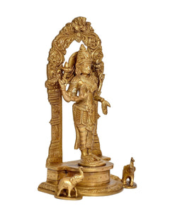 Brass Lakshmi-Laxmi idol back/side view with raised hand and decorative arch