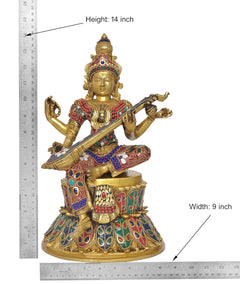 Saraswati brass idol on lotus, Height 14 in, Width 9 in, veena detail and jewelry