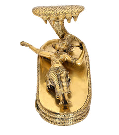 Brass Vishnu Yoga Nidra statue, seated on tall arched base with cobra details