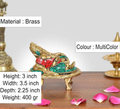 Brass Ganesha statue, 3-inch height; multicolor inlay on seated pedestal