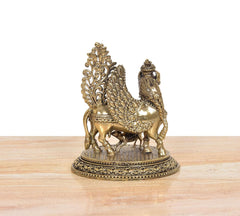 Brass Kamadhenu cow idol, close view of wings and ornamented body details