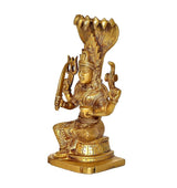 Gold brass Durga Mariamman idol side view, four-armed seated figure with detailed base