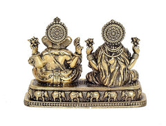 Brass Lakshmi and Ganesha idol, rear view with crowns and engraved base