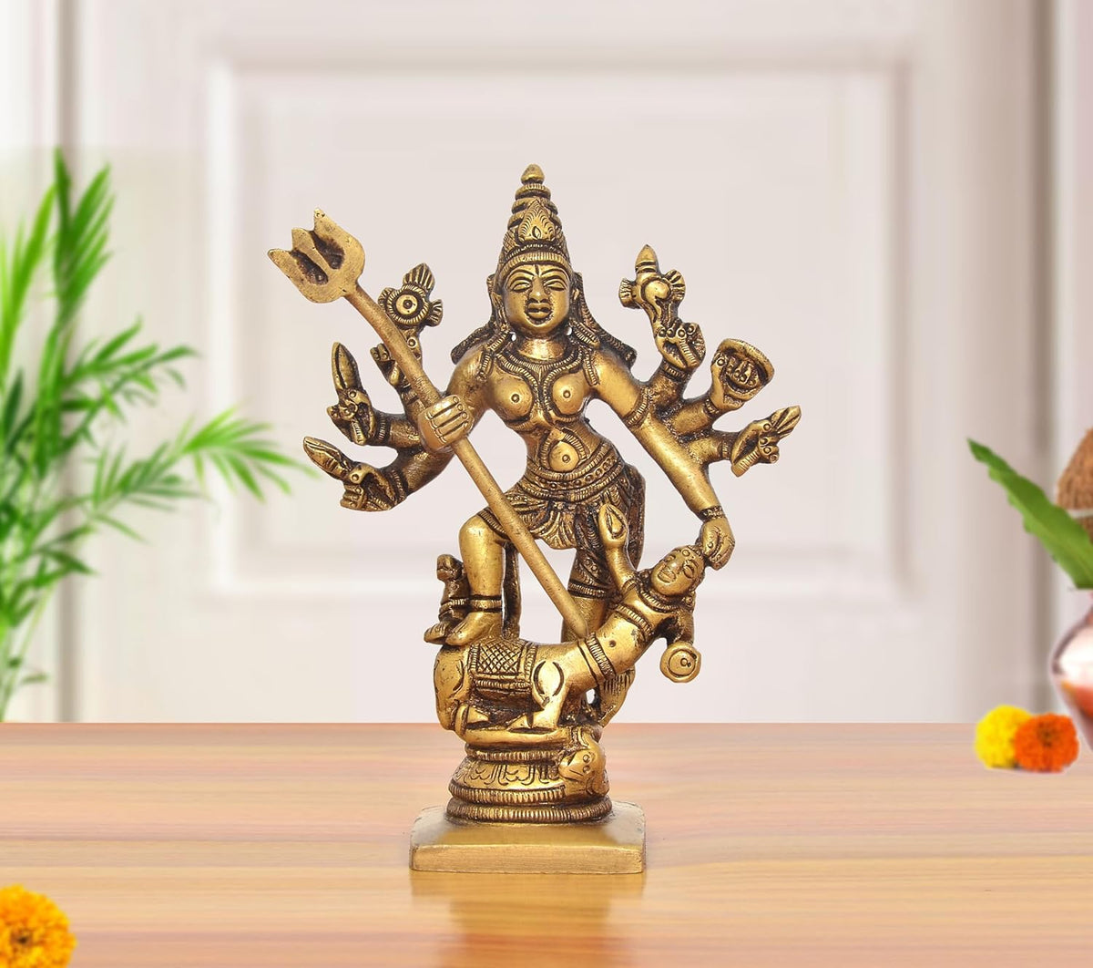 Brass Durga idol with raised trident and many arms, seated pose, 5 inch