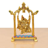 Front view golden Radha Krishna swing idol statue with hanging chains