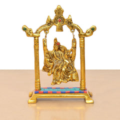 Front view golden Radha Krishna swing idol statue with hanging chains