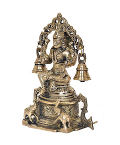 Lakshmi statue seated on pedestal with four flanking horses and hanging bells