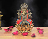 Ganapati Bappa brass idol in red and blue, seated on lotus base