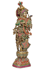 Brass Radha murti idol in profile, gold finish with green-red patterned garments