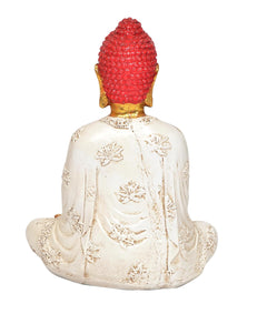 Rückansicht Buddha-Statue im Lotussitz, roter Kopf, weiße Robe mit Ornamenten