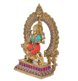 Side view Durga Maa brass statue with multicolor halo, seated figure, and lion
