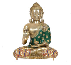 Brass seated Buddha idol with Abhaya mudra hand, green robe, decorated multicolor seat
