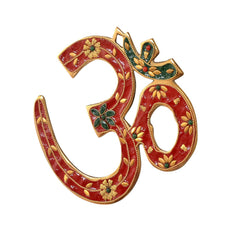 OM wall hanging brass sculpture, red and green enamel with gold edge detailing