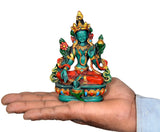 Green Tara resin statue in hand: teal seated goddess with gold crown, red base, 15 cm