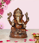 Ganesha idol statue, seated with raised hands on lotus base, bronze and gold finish