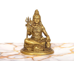 Brass Lord Shiva statue, blessing posture on round pedestal, detailed jewelry, 6.5-inch.