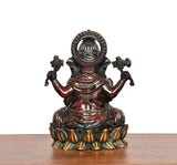 Lord Ganesha brass idol rear view with ornate back headpiece and lotus pedestal