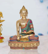 Brass meditating Buddha statue, seated in dhyan mudra, teal red mosaic robe