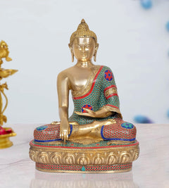 Brass meditating Buddha statue, seated in dhyan mudra, teal red mosaic robe