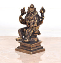 Brass Varaha-Lakshmi statue idol: Varaha with raised hands holding Bhudevi figure