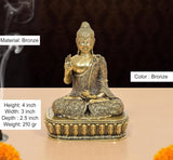 Bronze Buddha idol, Abhaya mudra gesture, seated with ornate robe, 4 in tall