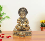 Brass Kuber figurine (6 in): seated deity with ornate crown and raised hand