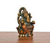 Multicolour Lord Ganesha brass idol, angled view, seated on a detailed base