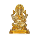 Brass Ganesha Vinayak idol, front view, detailed crown and seated figure on base