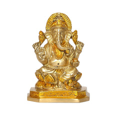 Brass Ganesha Vinayak idol, front view, detailed crown and seated figure on base