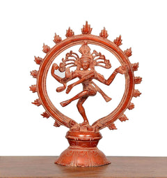 Dancing Lord Shiva statue in circular halo, multicolour red-brown tone, 9 inch