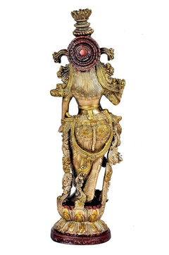 Brass Radha Krishna idol statue back view, gold-toned figure with circular red centerpiece