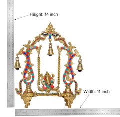 Brass Ganesha swing showpiece, shown height 14 in; colorful frame with bells