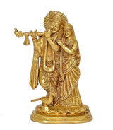Brass Radha Krishna idol statue, front view with raised hands and ornate robes