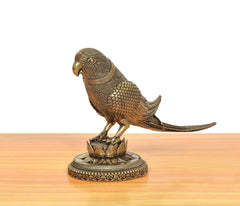Brass parrot statue front-left view, open-lotus base with ornamental details