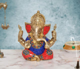 6-inch brass Ganpati idol with multicolor blue-red attire, four arms and raised hands