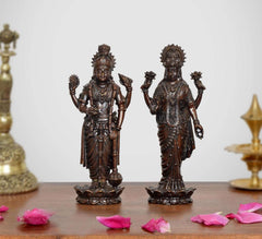 Bronze-tone brass standing Lakshmi and Vishnu idols, ornate crowns and raised hands