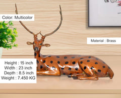 Brass sitting deer showpiece, multicolor orange with black spots; seated height 15 in