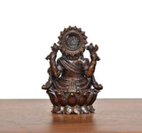 Lord Ganesha brass idol back view, ornate crown and engraved back panel details