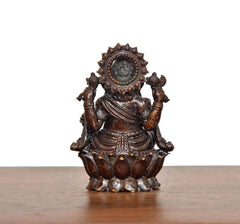 Lord Ganesha brass idol back view, ornate crown and engraved back panel details