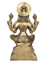 Lakshmi statue back view, round halo and draped hair, brass tone