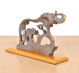 Resin elephant and baby elephant showpiece, rear/side angle on golden base