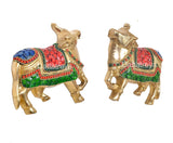 Brass Kamdhenu cow pair wall hanging, close view of painted blanket and collar ornaments