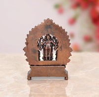Copper Vishnu statue back view with halo panel and standing deity on base