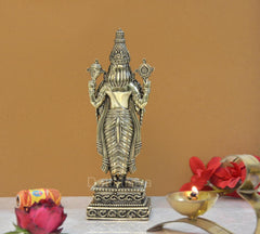 Brass Lord Tirupati Balaji figurine rear view with towering crown and patterned attire