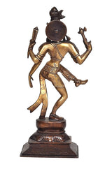Back view brass Ardhanarishwar idol, round back ornament, raised arms, dark base
